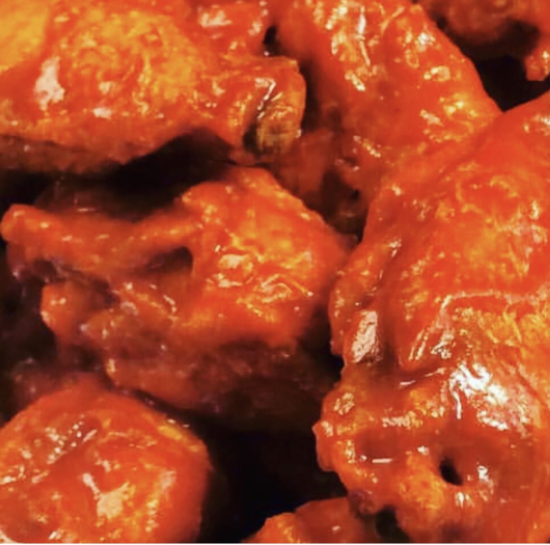 Order 12 Pieces Wings food online from Halal Munchies store, Queens on bringmethat.com