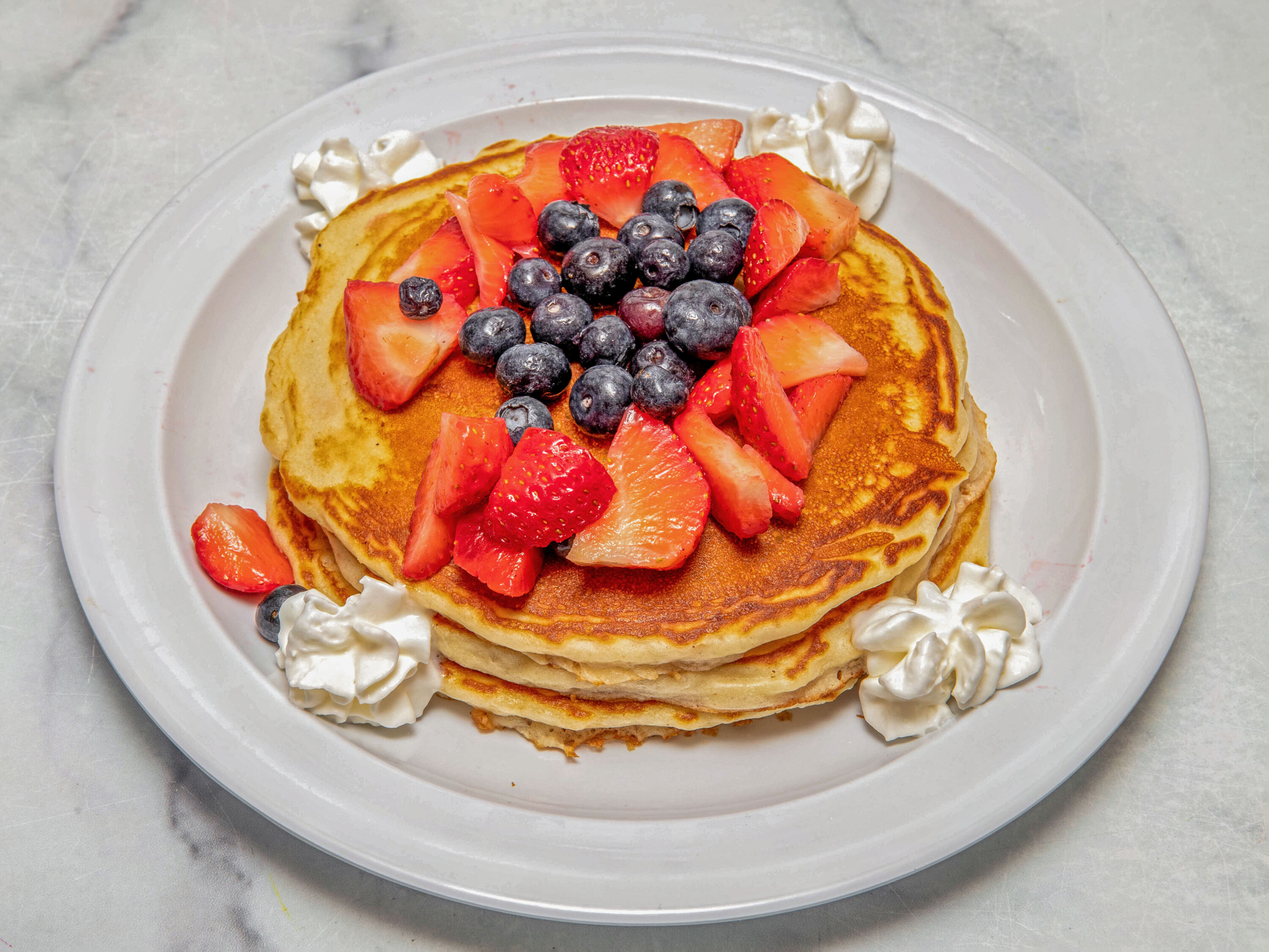Order Belgian Waffle with Butter and Syrup food online from NYC Bagel and Coffee House store, Queens on bringmethat.com