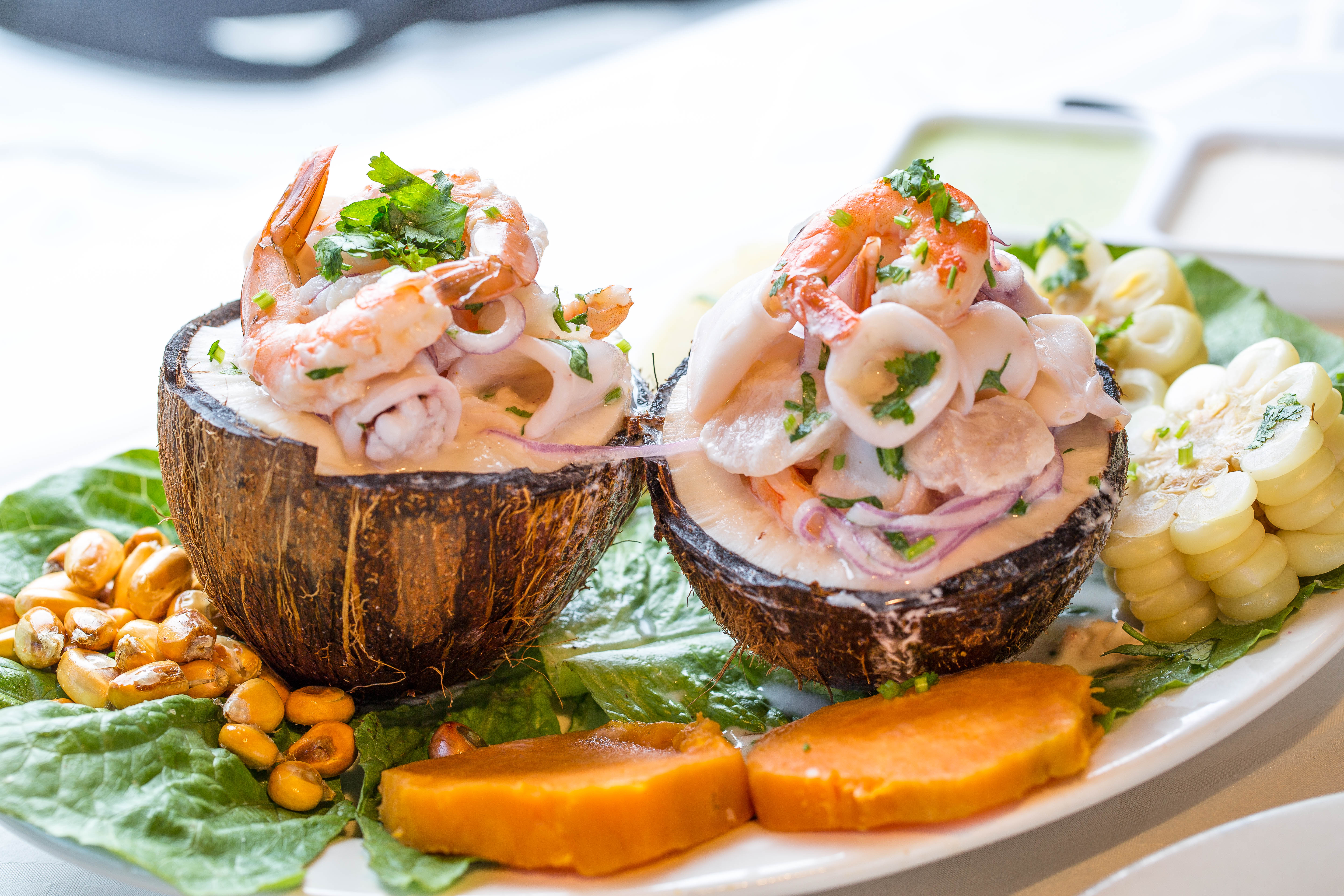 Order Ceviche Mixto al Coco food online from Riko Peruvian Cuisine store, Queens on bringmethat.com