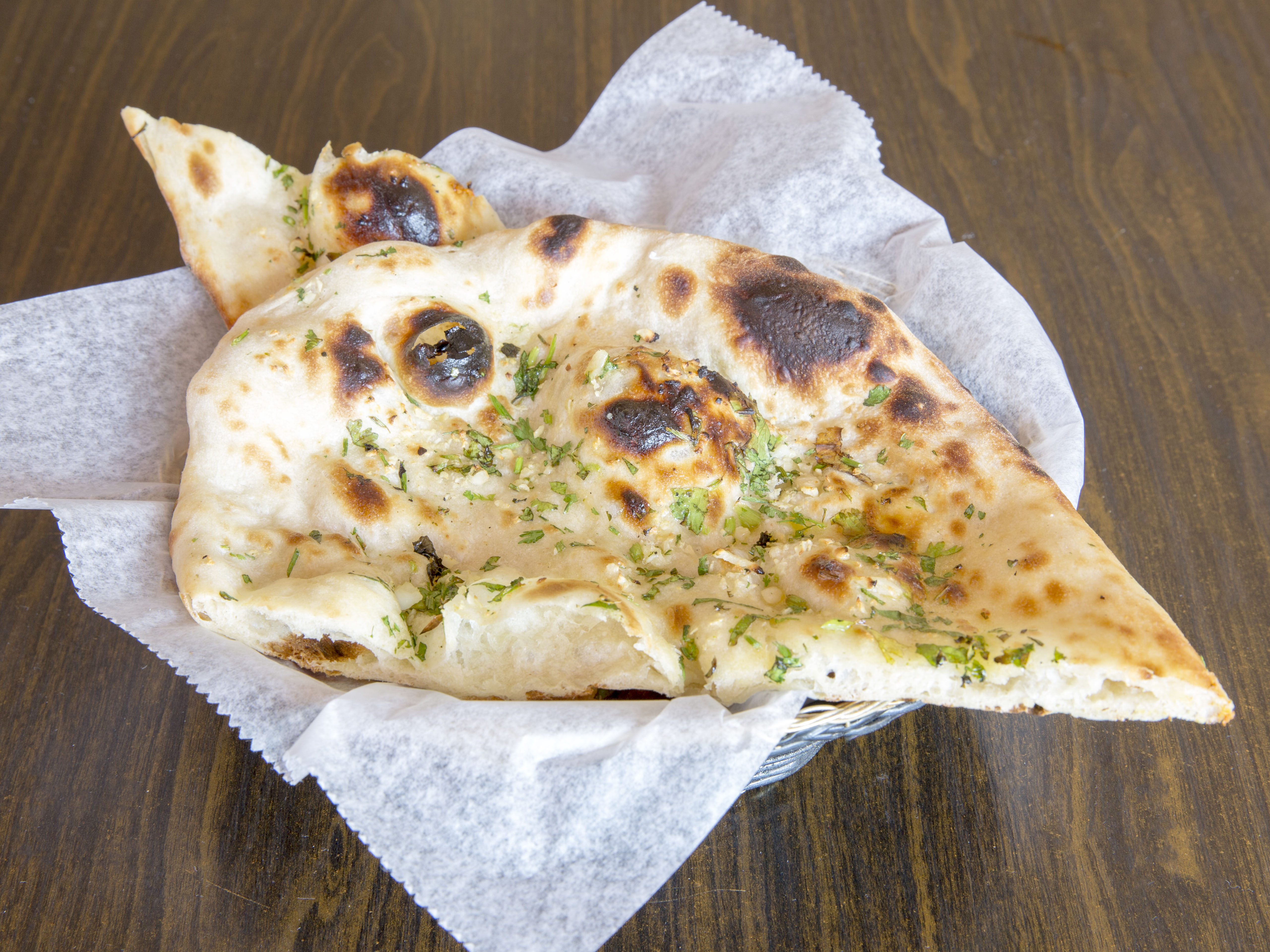 Order Garlic Naan food online from India's Flavor - Sparr Heights store, Glendale on bringmethat.com