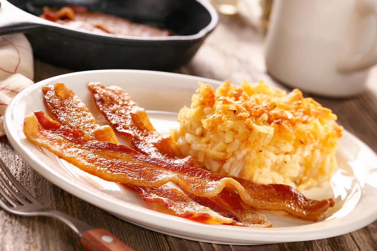 Order Bacon or Sausage with Fried Apples or Hashbrown Casserole food online from Cracker Barrel store, Rochester on bringmethat.com